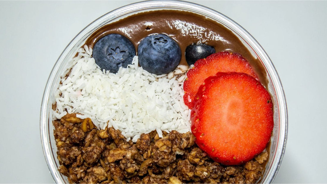 Locked In chocolate milkshake protein ice cream bowl with fruit and granola topping