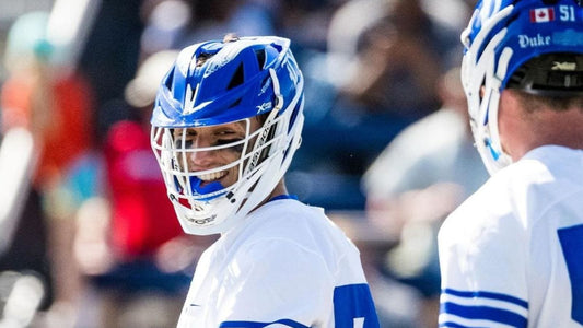 Josh in Duke uniform playing lacrosse