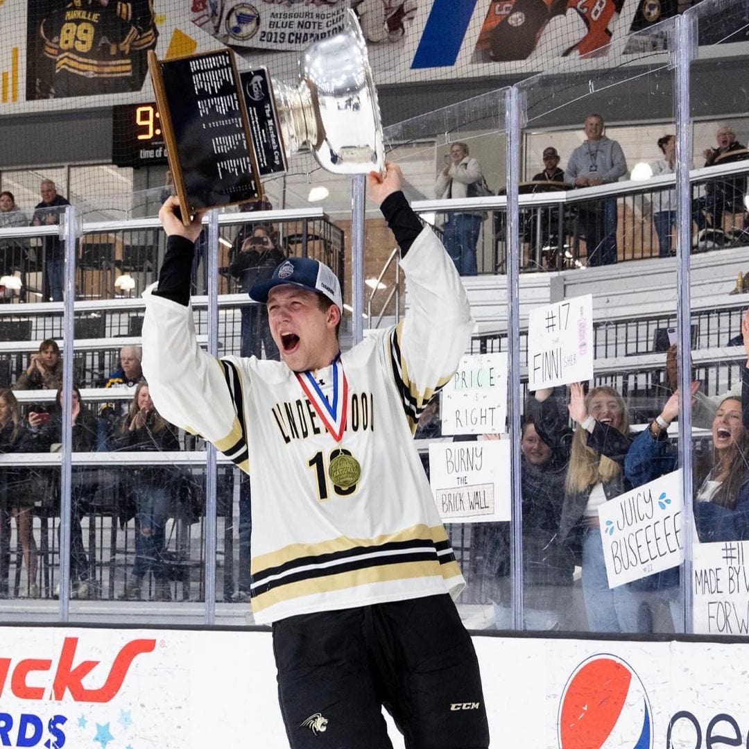 Caige celebrating national hockey championship win Lindenwood