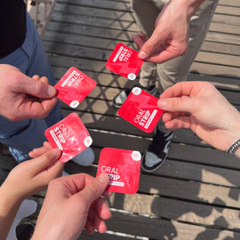 people holding a locked in energy strip in a circle