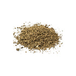 Pile of dried valerian root on a white background